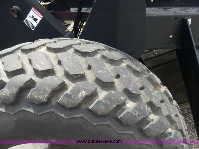 image for item K3113 2003 MacDon 9352 self-propelled windrower