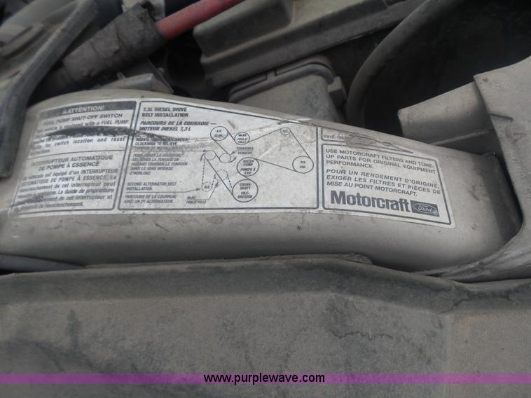 image for item AQ9632 1999 Ford F350 Super Duty Crew Cab pickup truck cab and chassis