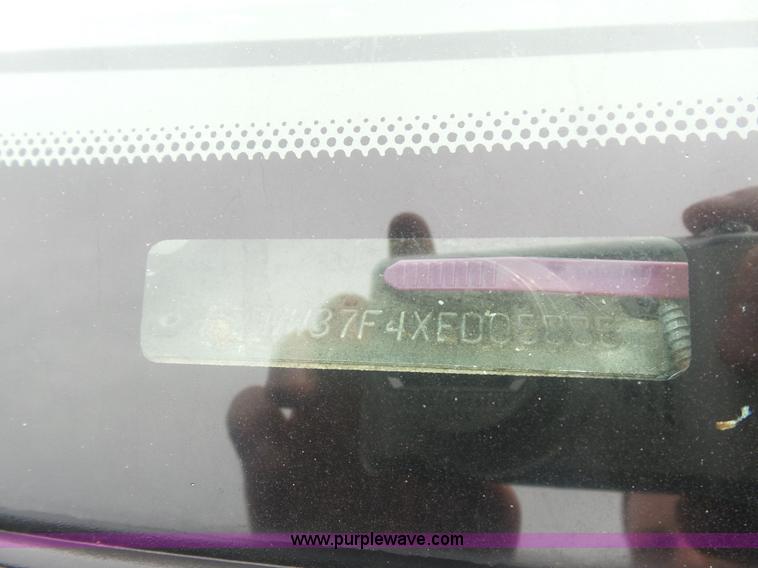 image for item AQ9632 1999 Ford F350 Super Duty Crew Cab pickup truck cab and chassis