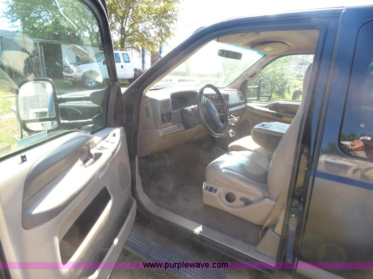 image for item CD9392 2000 Ford F250 Super Duty SuperCab flatbed pickup truck