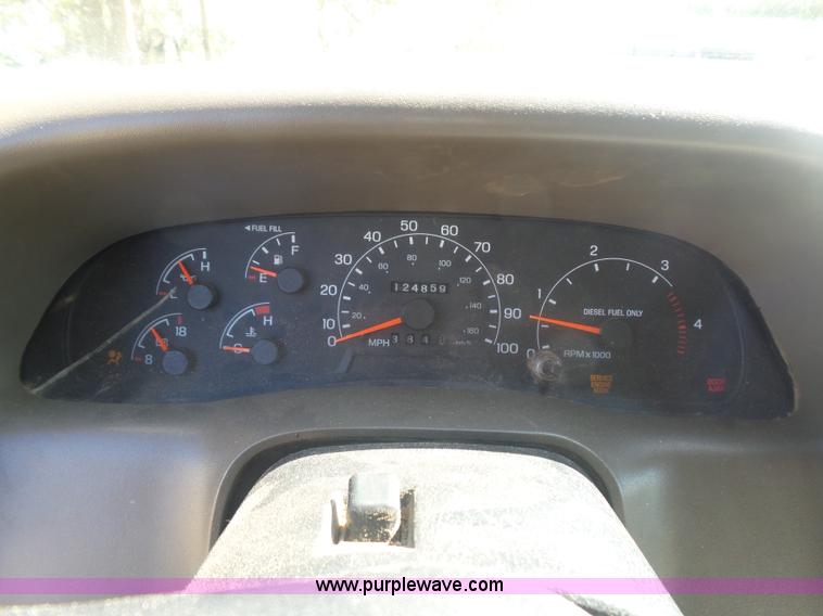 image for item CD9392 2000 Ford F250 Super Duty SuperCab flatbed pickup truck