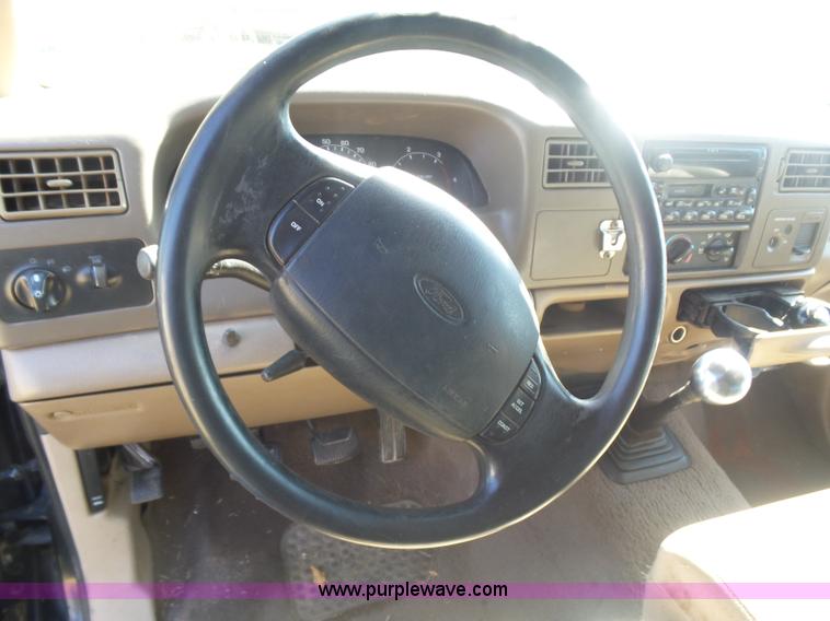 image for item CD9392 2000 Ford F250 Super Duty SuperCab flatbed pickup truck