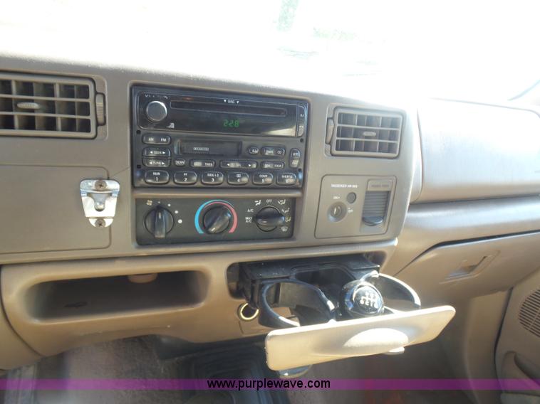 image for item CD9392 2000 Ford F250 Super Duty SuperCab flatbed pickup truck