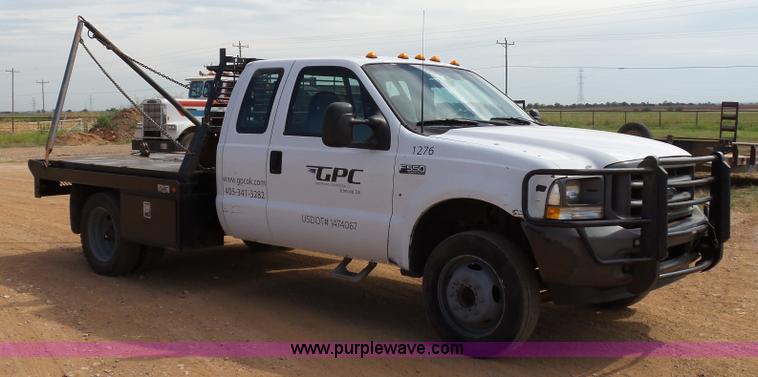 image for item DB4503 2002 Ford F550 SuperCab flatbed truck