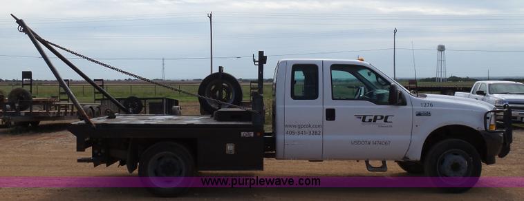 image for item DB4503 2002 Ford F550 SuperCab flatbed truck