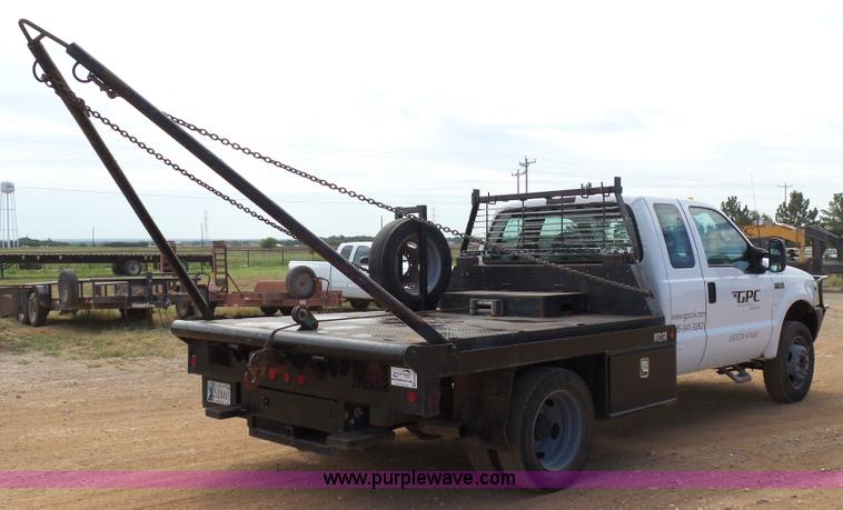image for item DB4503 2002 Ford F550 SuperCab flatbed truck