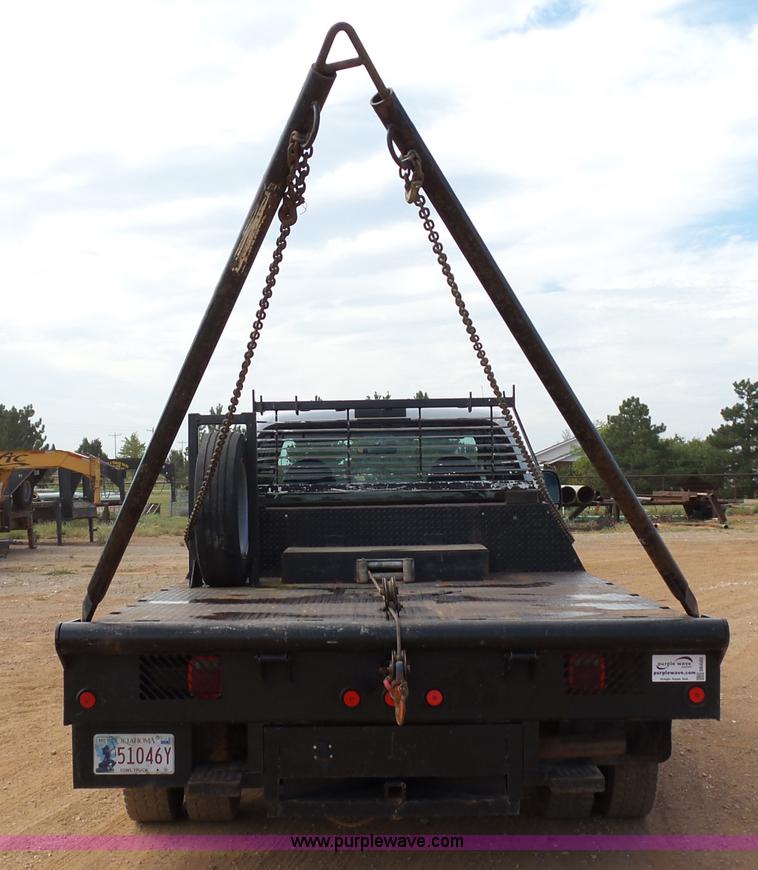 image for item DB4503 2002 Ford F550 SuperCab flatbed truck