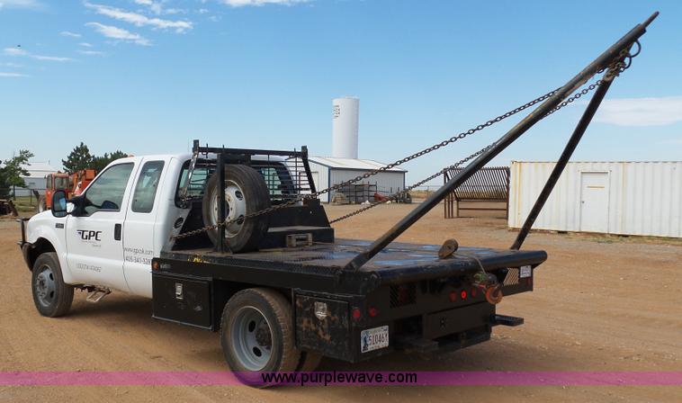 image for item DB4503 2002 Ford F550 SuperCab flatbed truck