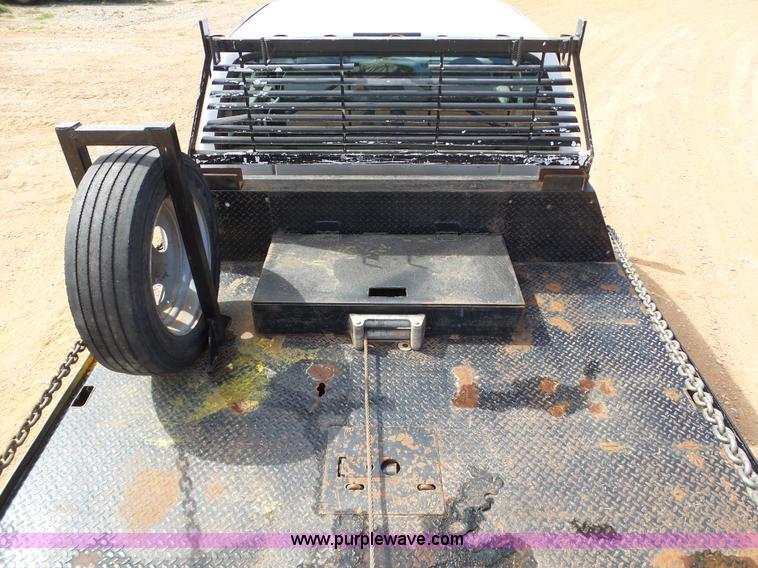 image for item DB4503 2002 Ford F550 SuperCab flatbed truck