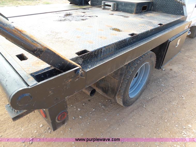 image for item DB4503 2002 Ford F550 SuperCab flatbed truck