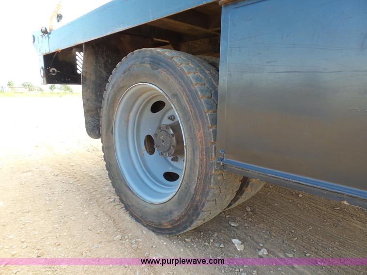 image for item DB4503 2002 Ford F550 SuperCab flatbed truck