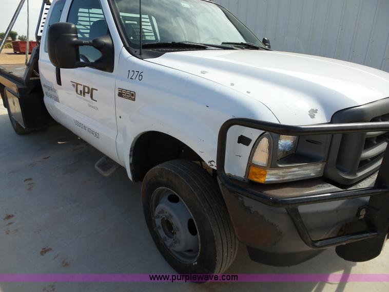 image for item DB4503 2002 Ford F550 SuperCab flatbed truck
