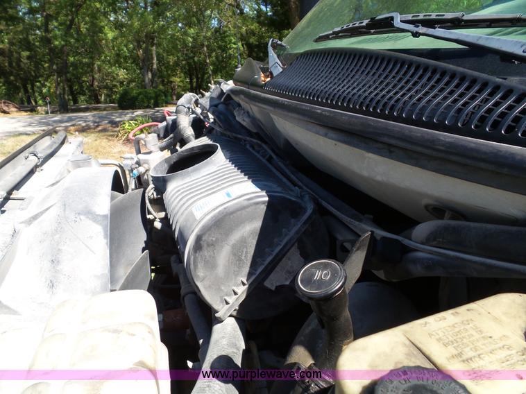 image for item J4821 2006 Chevrolet C6500 flatbed truck