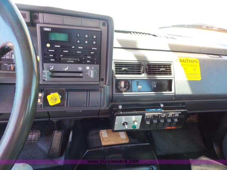 image for item BK9639 1997 Chevrolet C7500 digger derrick truck