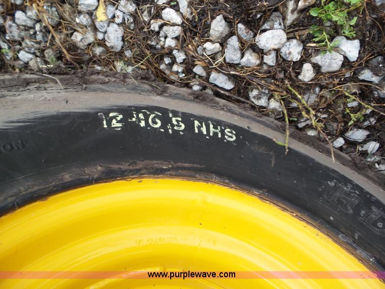 image for item BZ9797 2015 John Deere 328E skid steer