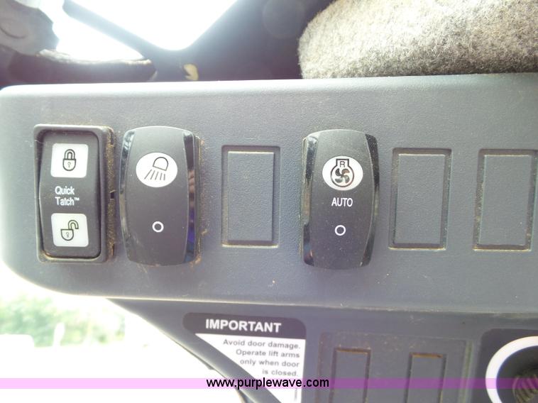 image for item BZ9797 2015 John Deere 328E skid steer