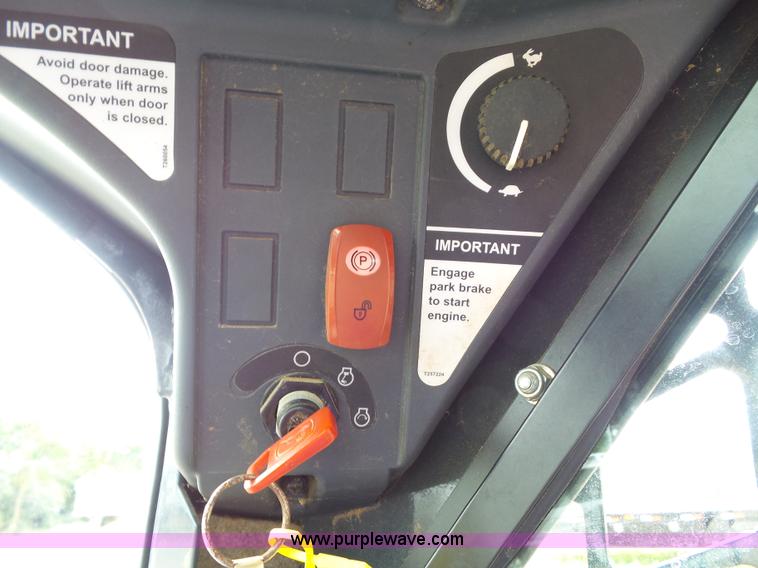 image for item BZ9797 2015 John Deere 328E skid steer