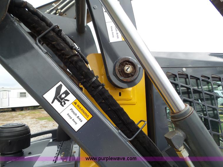 image for item BZ9797 2015 John Deere 328E skid steer