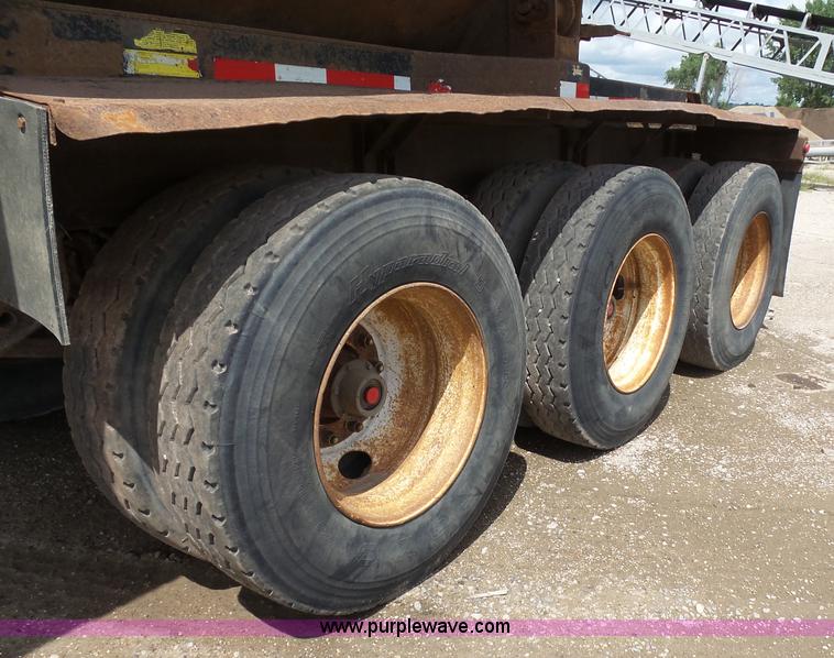 image for item J1639 1997 Smithco side dump trailer