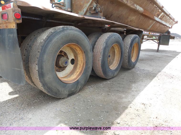 image for item J1639 1997 Smithco side dump trailer