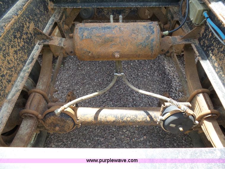 image for item J1642 1998 Smithco side dump trailer