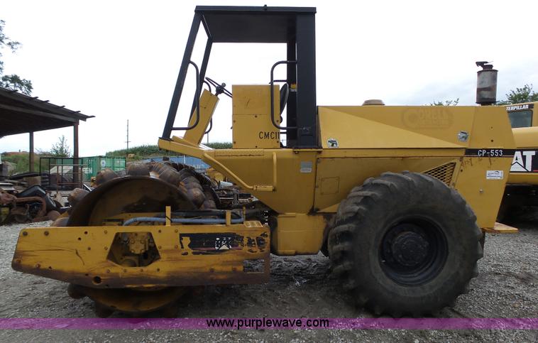 image for item K8446 1988 Caterpillar CP553 single drum pad foot compactor