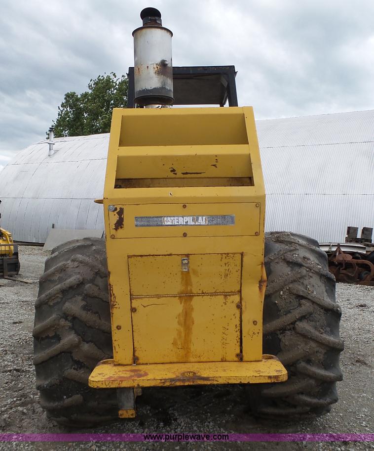 image for item K8446 1988 Caterpillar CP553 single drum pad foot compactor