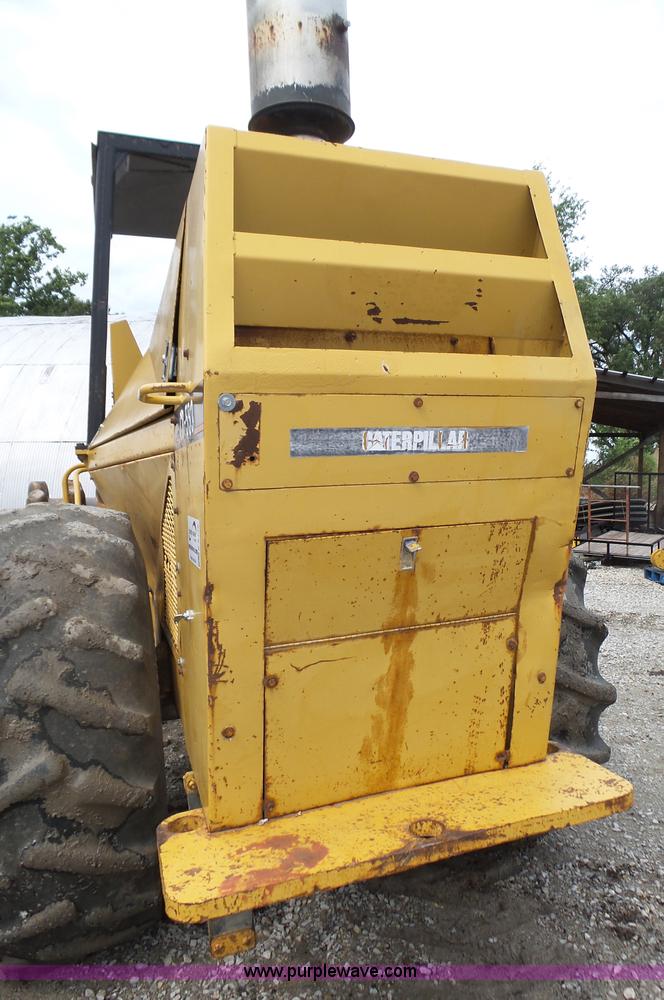 image for item K8446 1988 Caterpillar CP553 single drum pad foot compactor