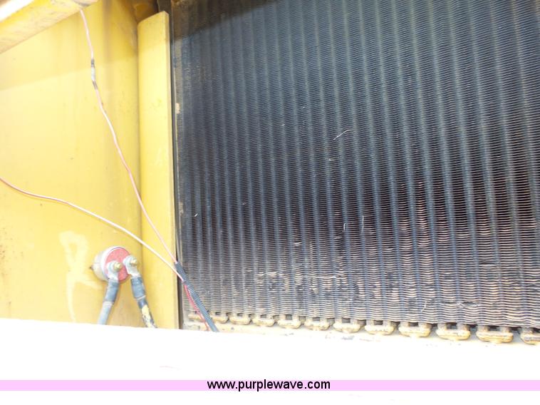 image for item K8446 1988 Caterpillar CP553 single drum pad foot compactor