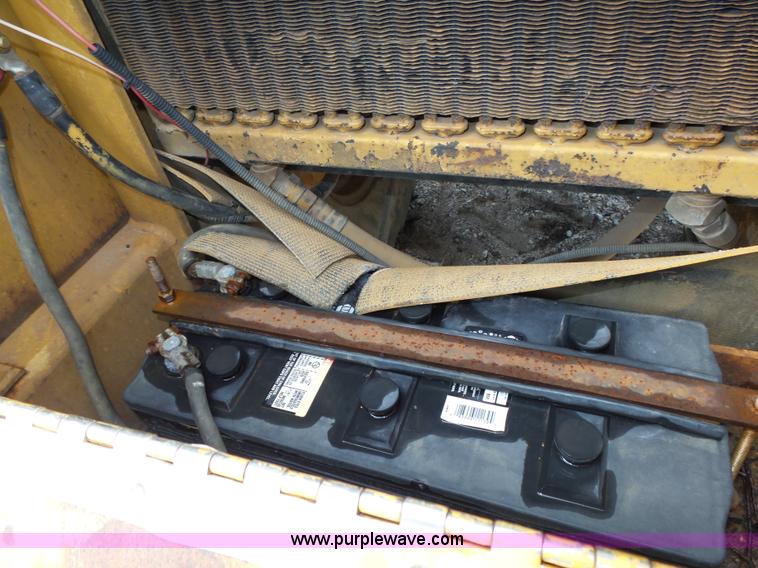 image for item K8446 1988 Caterpillar CP553 single drum pad foot compactor