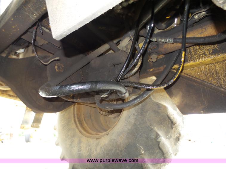 image for item K8446 1988 Caterpillar CP553 single drum pad foot compactor