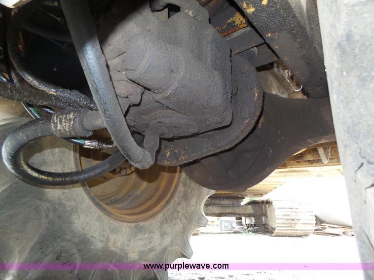 image for item K8446 1988 Caterpillar CP553 single drum pad foot compactor