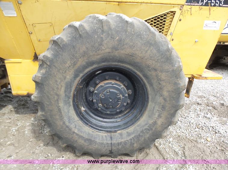 image for item K8446 1988 Caterpillar CP553 single drum pad foot compactor