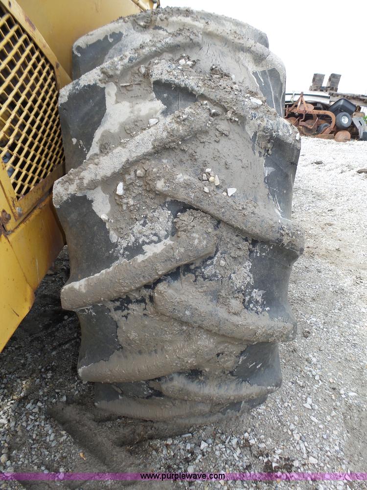 image for item K8446 1988 Caterpillar CP553 single drum pad foot compactor