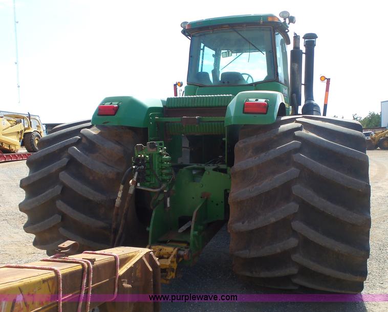 image for item K7011 2005 John Deere 9520 4WD tractor