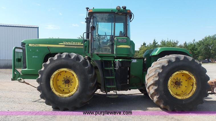 image for item K7011 2005 John Deere 9520 4WD tractor
