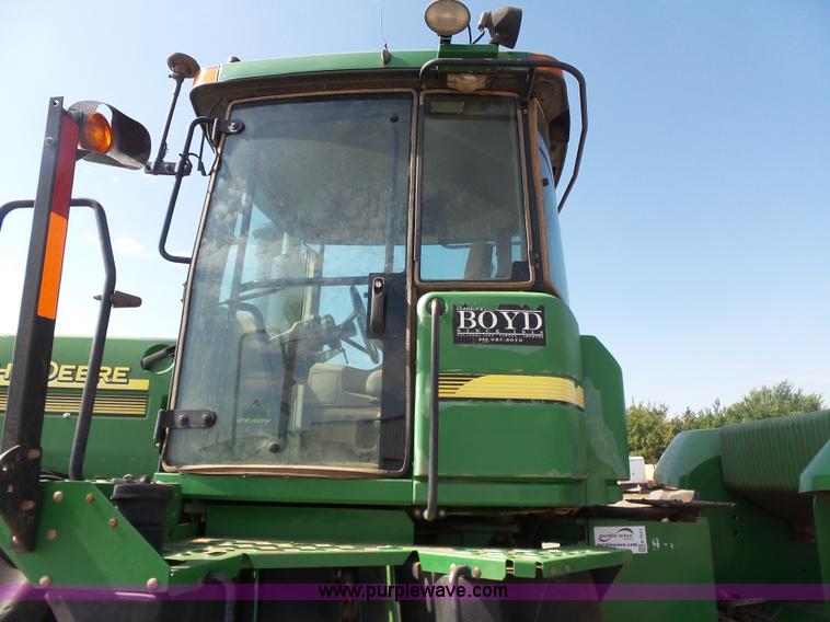 image for item K7011 2005 John Deere 9520 4WD tractor