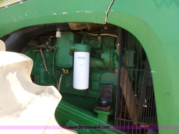 image for item K7011 2005 John Deere 9520 4WD tractor