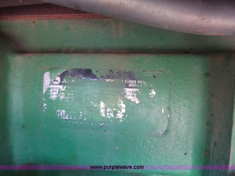 image for item K7011 2005 John Deere 9520 4WD tractor