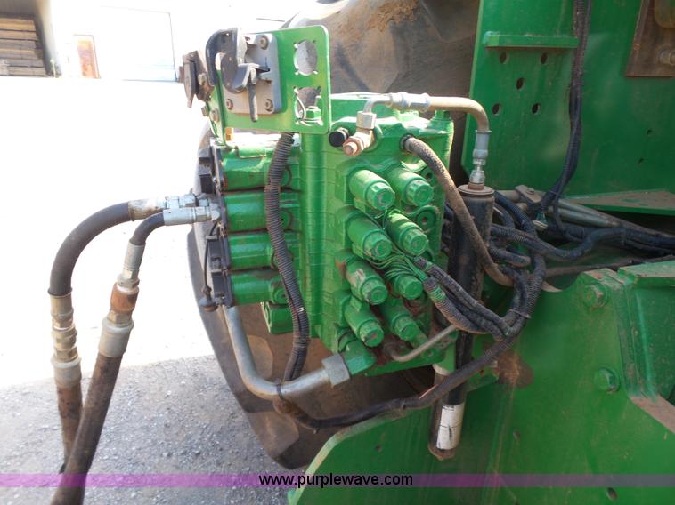 image for item K7011 2005 John Deere 9520 4WD tractor