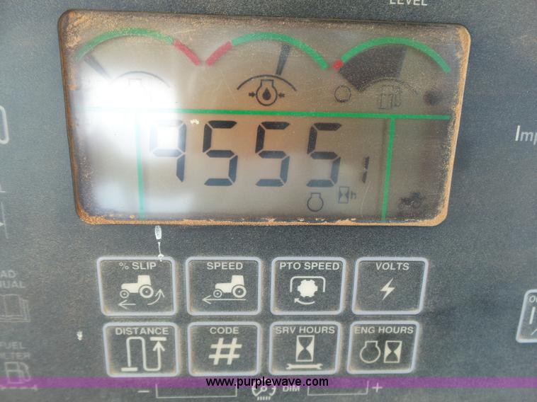 image for item K7011 2005 John Deere 9520 4WD tractor