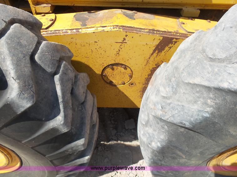 image for item K7050 2002 John Deere 770CH Series II motor grader