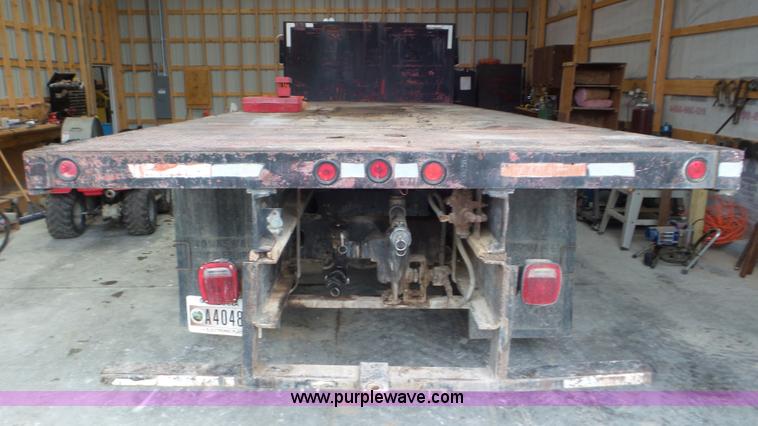 image for item L6936 1995 GMC TopKick 7000 flatbed truck