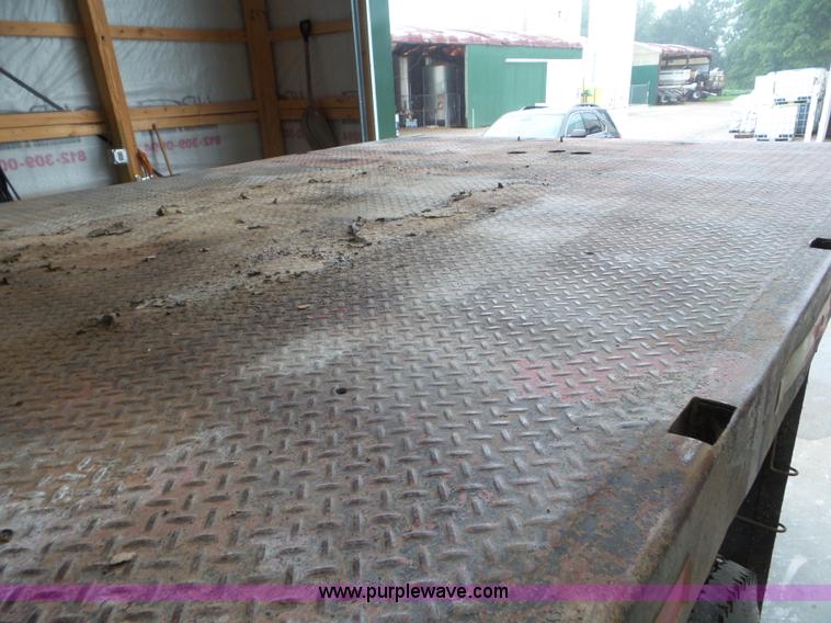 image for item L6936 1995 GMC TopKick 7000 flatbed truck