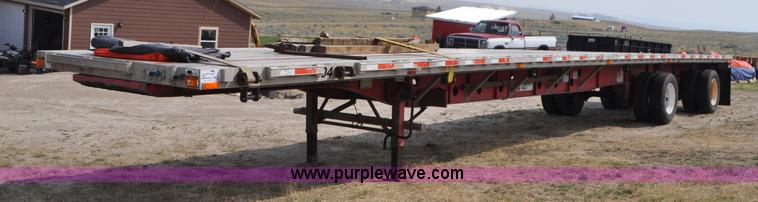 image for item G7471 2003 Transcraft Eagle RS2 flatbed trailer