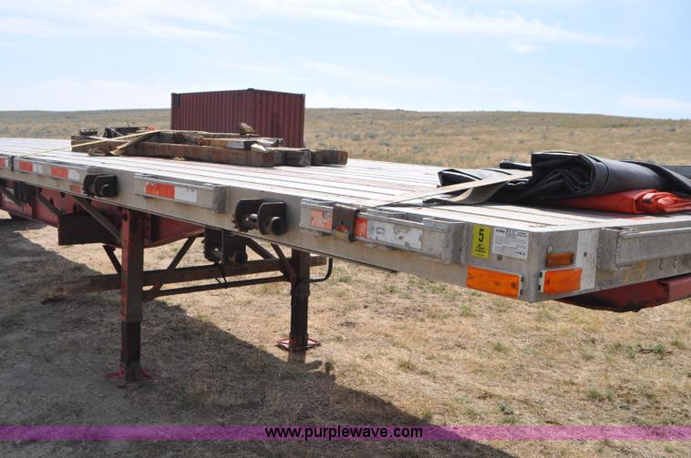 image for item G7471 2003 Transcraft Eagle RS2 flatbed trailer