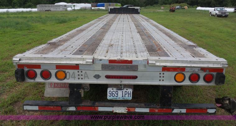 image for item K1608 2010 Fontaine drop deck equipment trailer