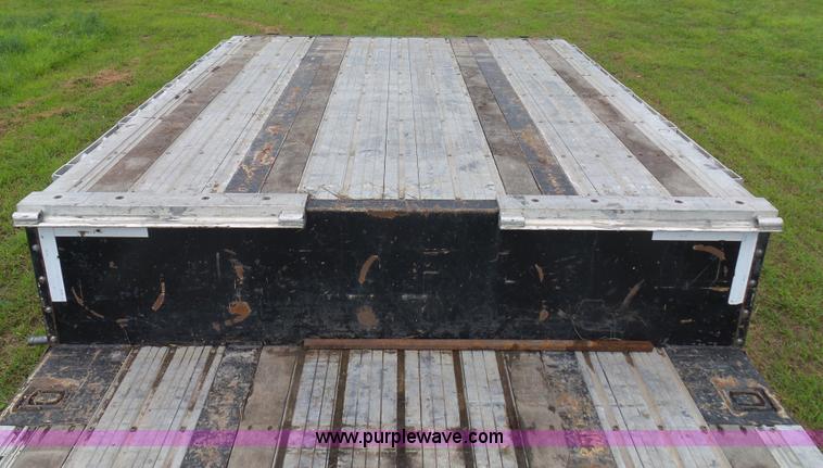 image for item K1608 2010 Fontaine drop deck equipment trailer