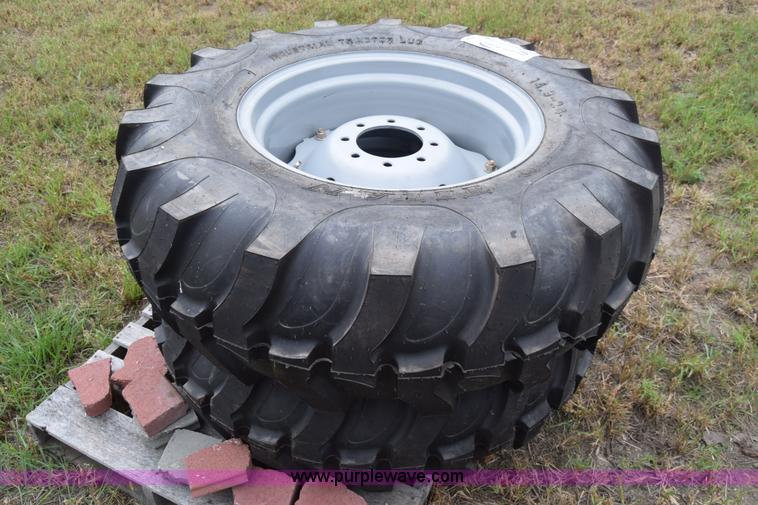 image for item L2624 (2) 14.9-24 tractor tires and wheels