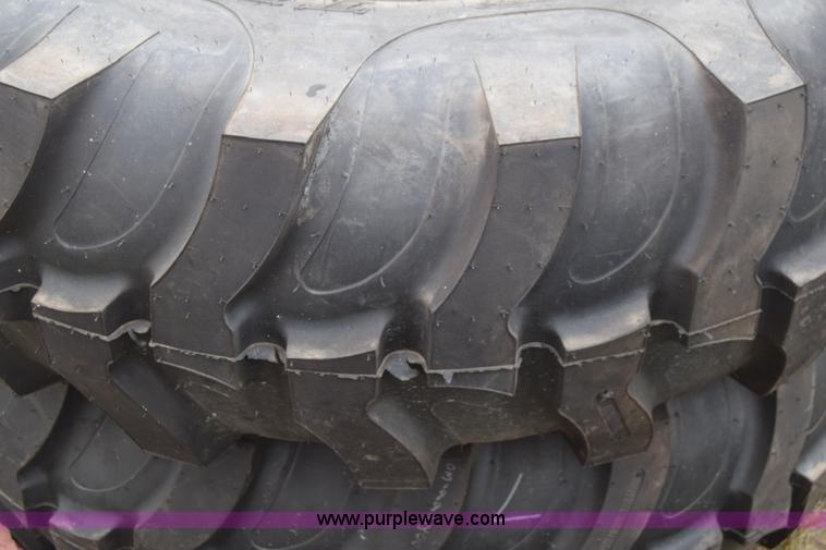 image for item L2624 (2) 14.9-24 tractor tires and wheels